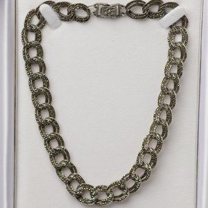 A Vintage Silver and Marcasite set consisting of matching Necklace & Bracelet